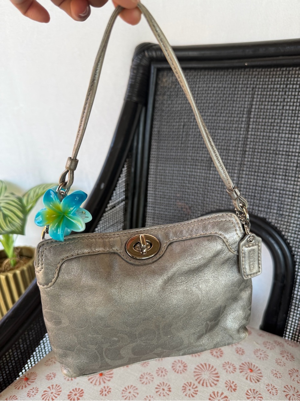 Coach Metallic Silver Signature Wristlet with Blue Flower Charm